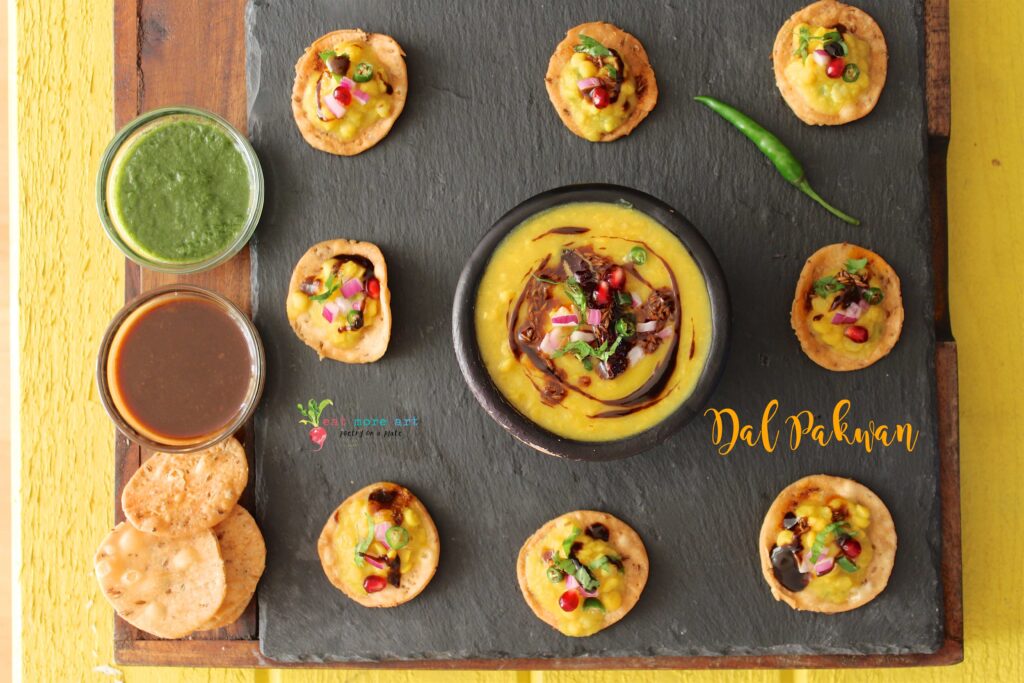 An overhead shot of Dal Pakwan bites served with chutneys